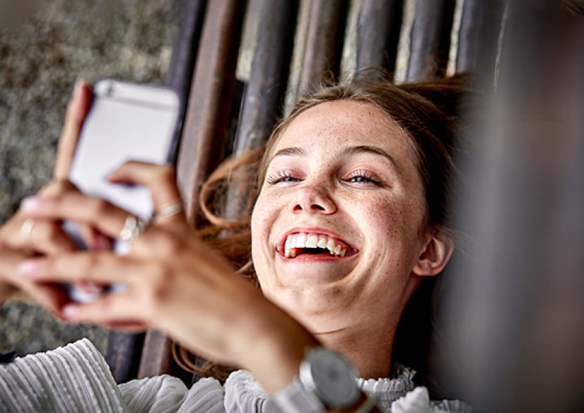 Young woman making video call and smiling
